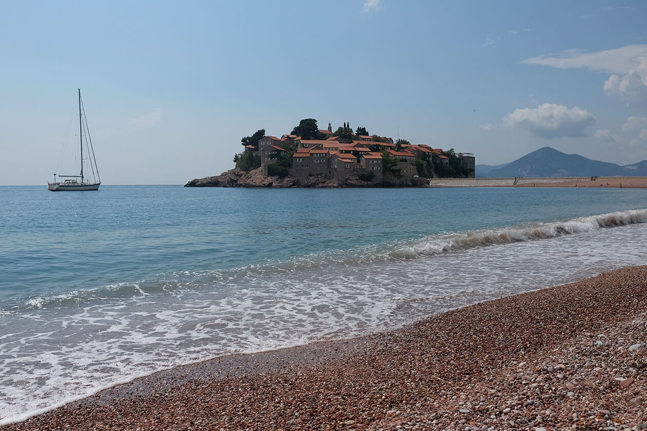 Sveti Stefan island from the public beach. The pebble really is that pink!