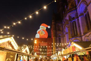 A huge Santa presides over the Manchester Christmas Market in Albert Square