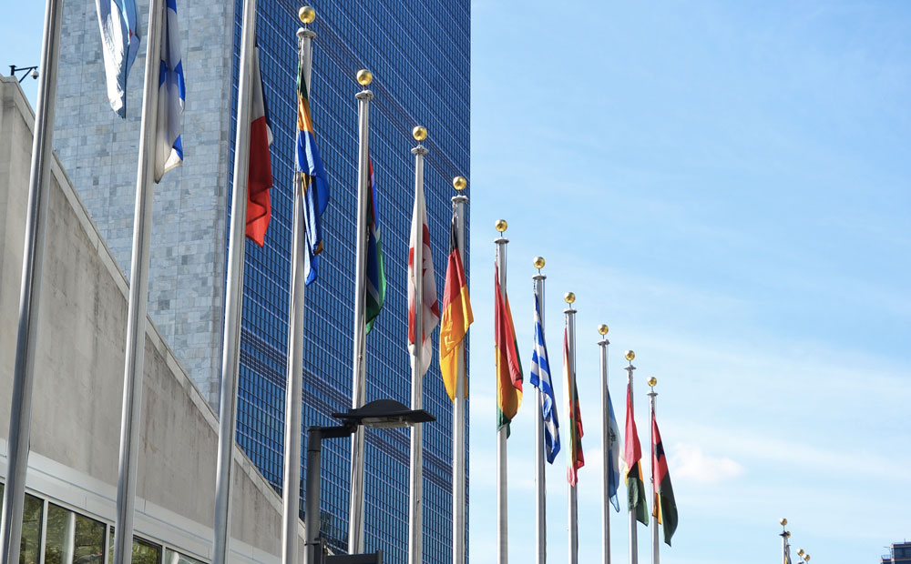 Flags of the world outside the United Nations building in New York