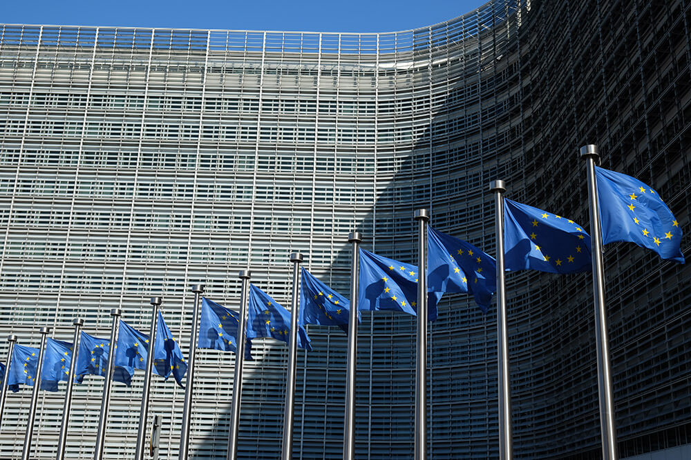 European Union flags outside the Berlaymont Building in Brussels