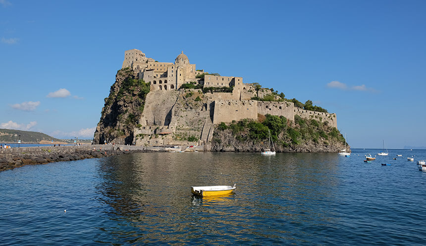 Castello Aragonese sits romantically at the end of a long causeway in Ischia Ponte. Visiting the castle is one of the best things to do in Ischia.