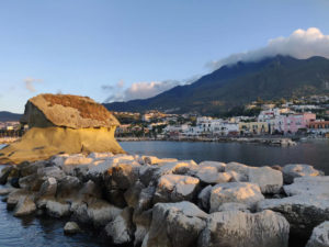 The Fungo mushroom rock in Lacco Ameno, with Monte Epomeo in the background