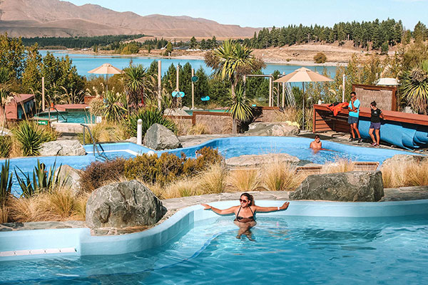 Relax in one of the three hot spring pools at Tekapo Springs with a view of UNESCO-listed Lake Tekapo