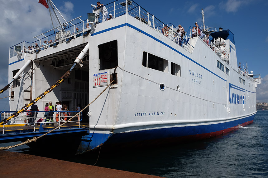 A Caremar ferry from Ischia docked at Marina Grande on Procida