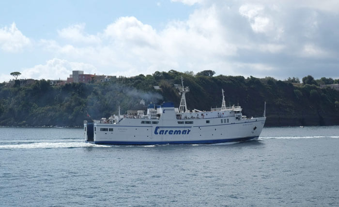 A Caremar ferry to Ischia passing Procida