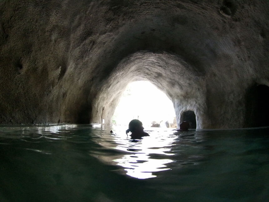 The Onphalos pool is in a cave and is the temperature of a gentlly warm bath for ultimate relaxation