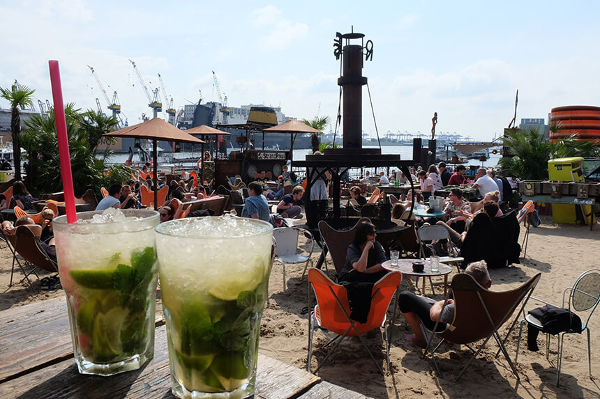 The Strandpauli beach bar is a great place to relax with a cocktail and watch the giant container ships glide past