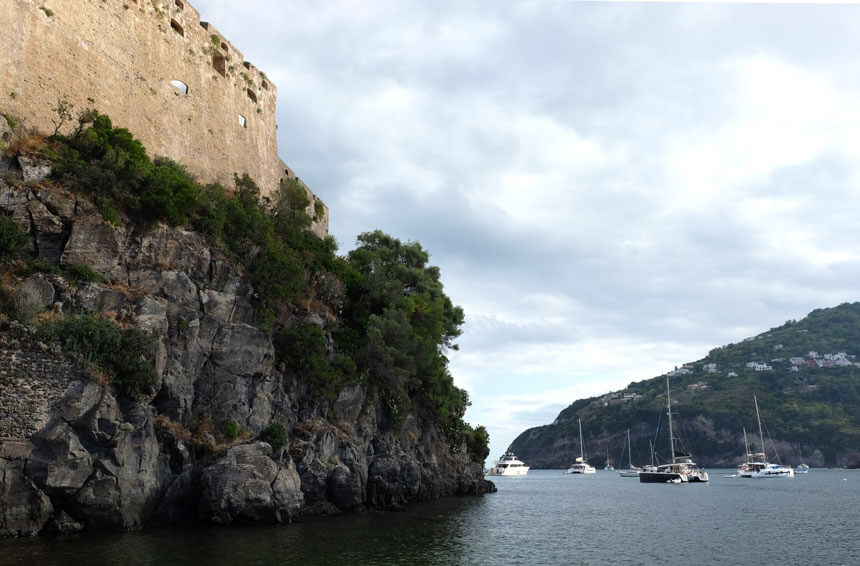 Looking up at the castle walls from the bridge that links it to Ischia Ponte