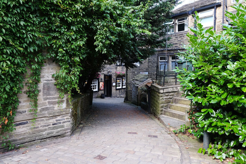 Church Street in Haworth. Most roads in the village are very narrow.