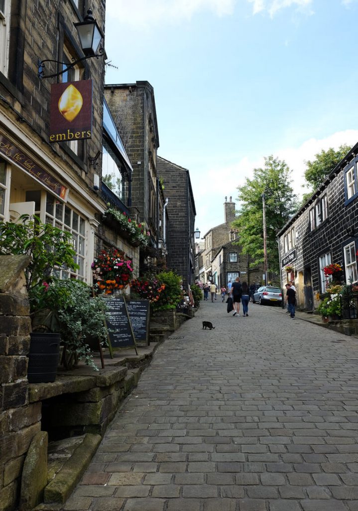 Looking up Haworth Main Street. The railway station is at the bottom of the hill, while the Brontë Parsonage Museum is at the top. Luckily there are plenty of inviting pubs and tea rooms on the way. 