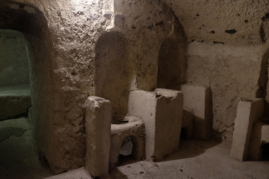 The stone chairs in the Nuns' Cemetery. The nuns' dead bodies were placed on these stone chairs and allowed to slowly decompose. The bowls underneath are for... fluids