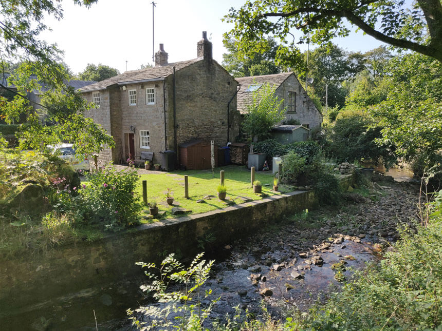 Some of the lovely cottages by the river in Wycoller village.