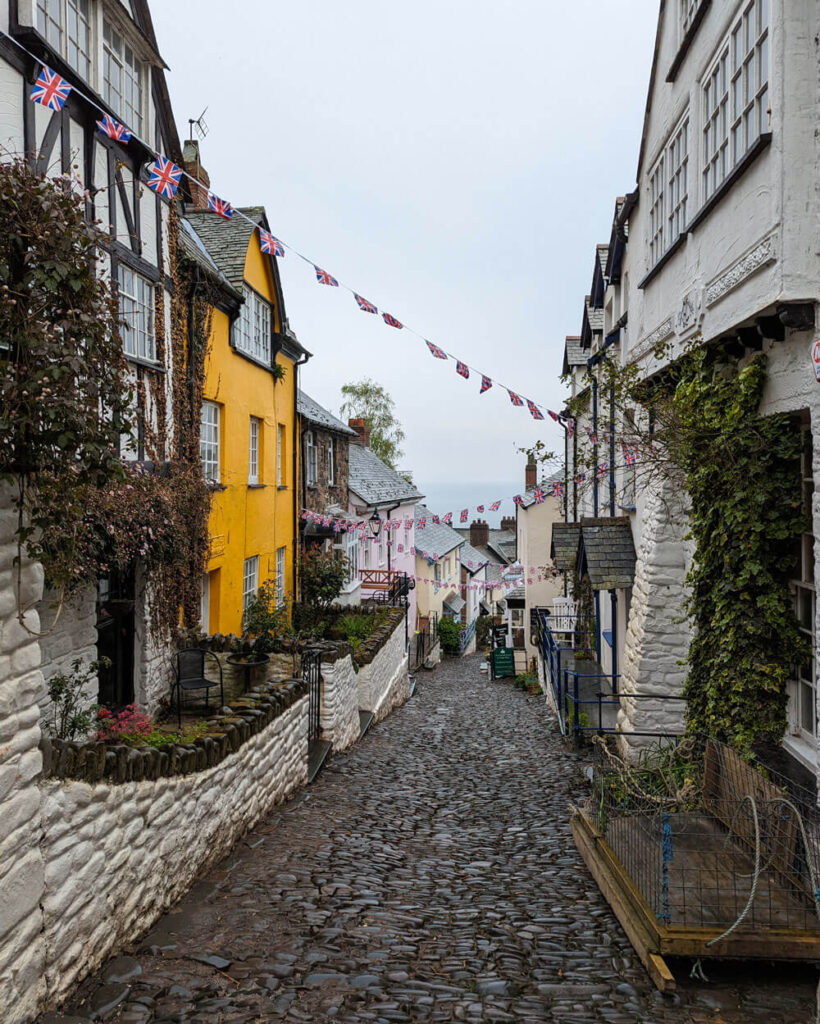 The main street in Clovelly, North Devon. On the bottom left you can see one of the sledges that residents use for carrying their shopping.