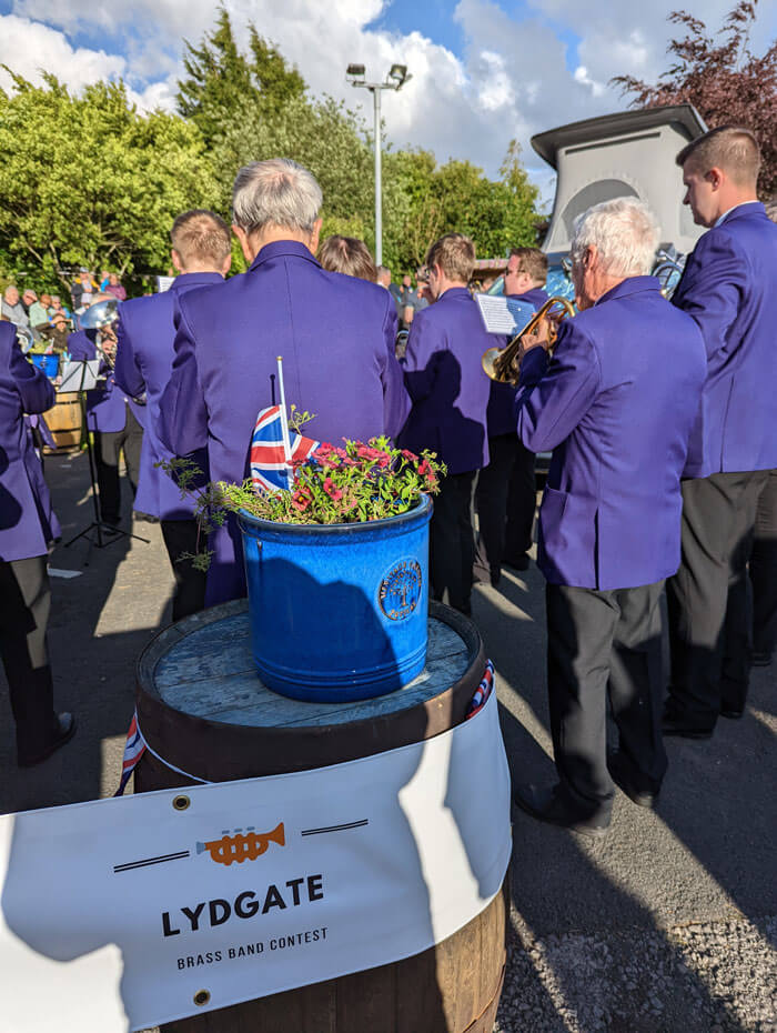 The Whit Friday band contest in Lydgate. The judge is listening inside the camper van behind the band (with all the curtains closed, of course)