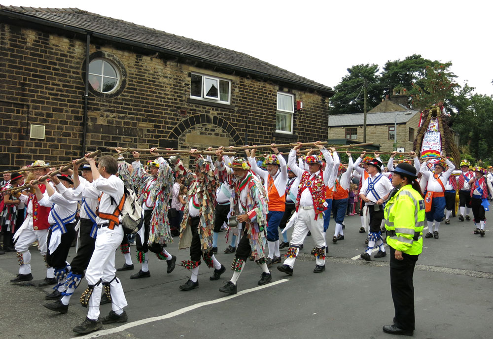 My first experience of Saddleworth Rushcart in 2013. Morris Men pull the rushcart through Greenfield.