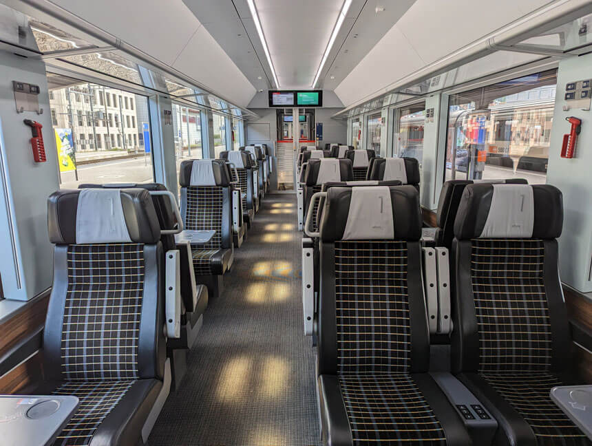 First class seats in one of the newer carriages, ready to depart from Chur to St Moritz