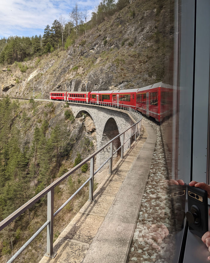 My partner took this photo of the train going across the Landwasser Viaduct. My photos looking the other way towards the tunnel had lots of reflections from the train windows.