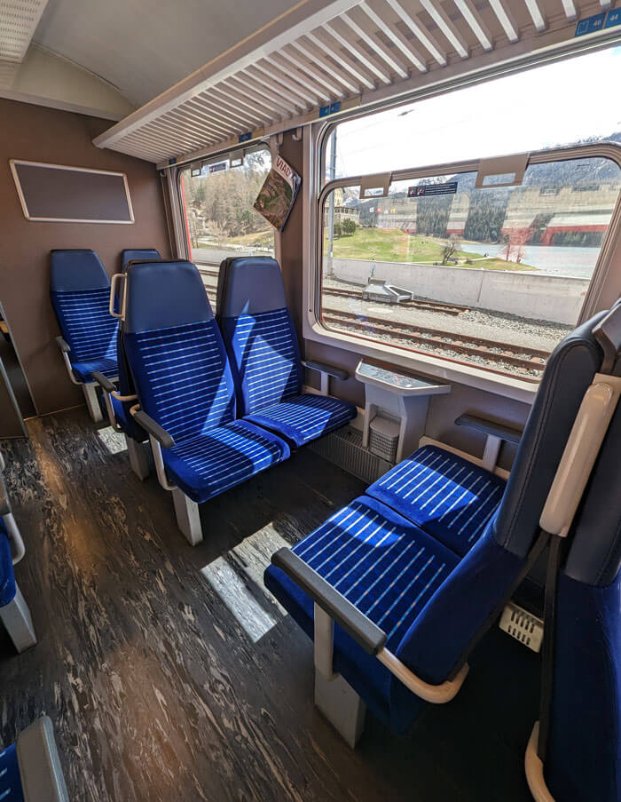 Second class seats in one of the older coaches. The window is open as far as it will go - it's enough though.