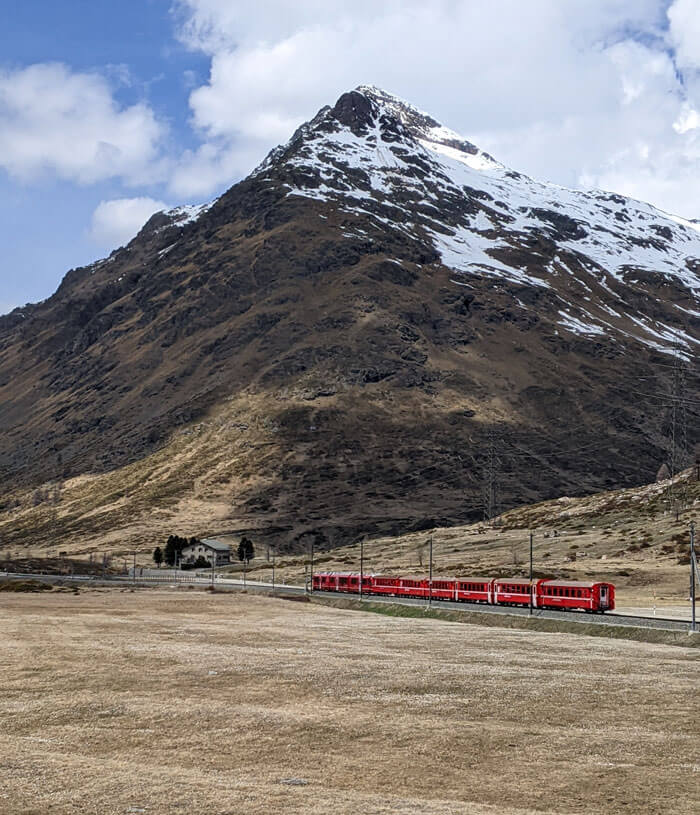 The train runs through spectacular mountain scenery
