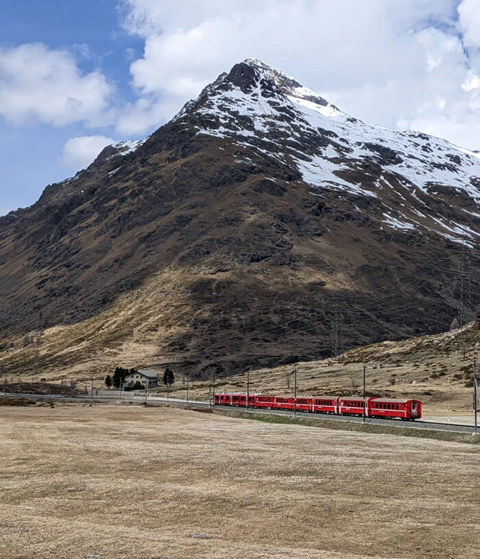 The train runs through spectacular mountain scenery