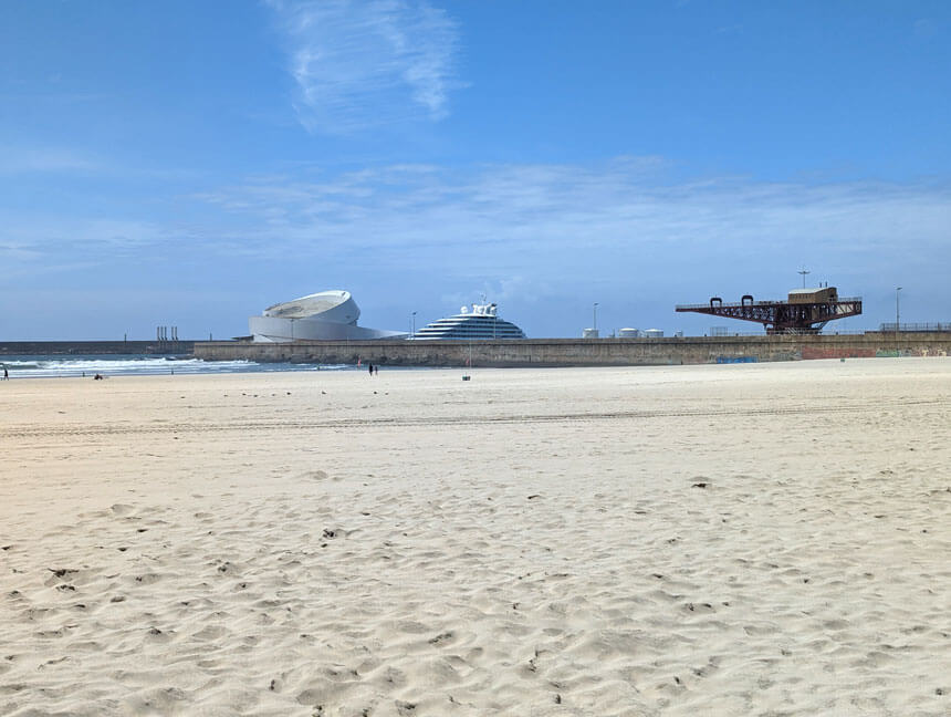The beautiful sandy beach in Matosinhos. The curly white building is Porto's cruise terminal