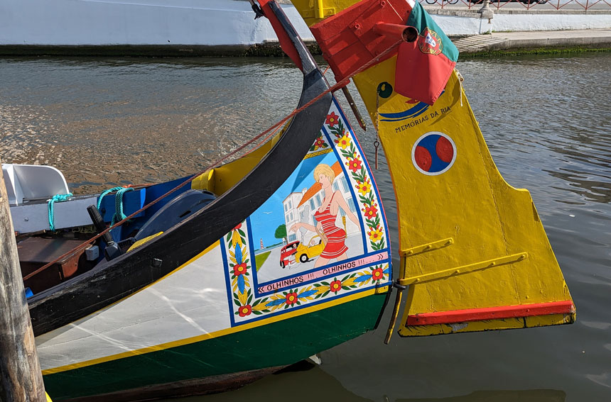 A close up of one of the paintings on a moliceiro canal boat in Aveiro
