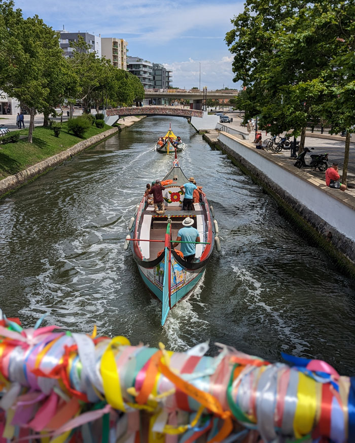 The ribbon bridges in Aveiro are a great place to watch the moliceiro boats go by