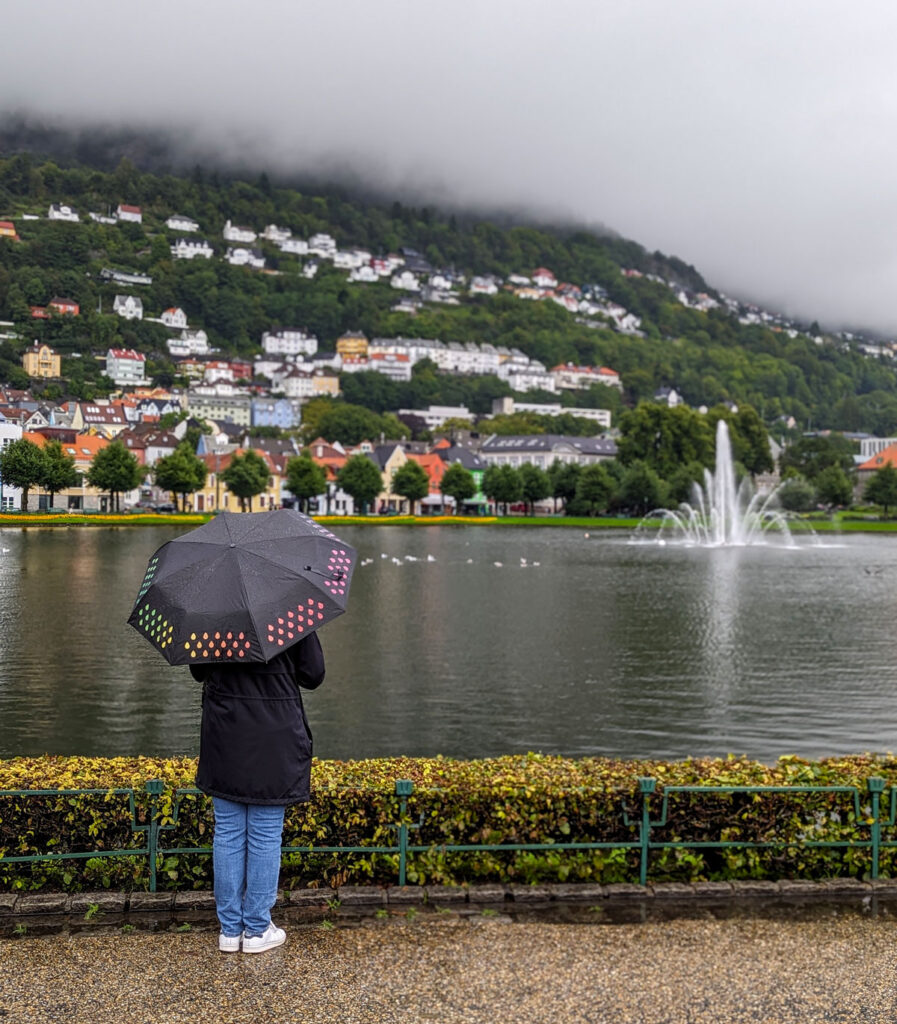 Me looking out over the lake in Bergen's city park. Read on for my favourite things to do in Bergen when it rains.