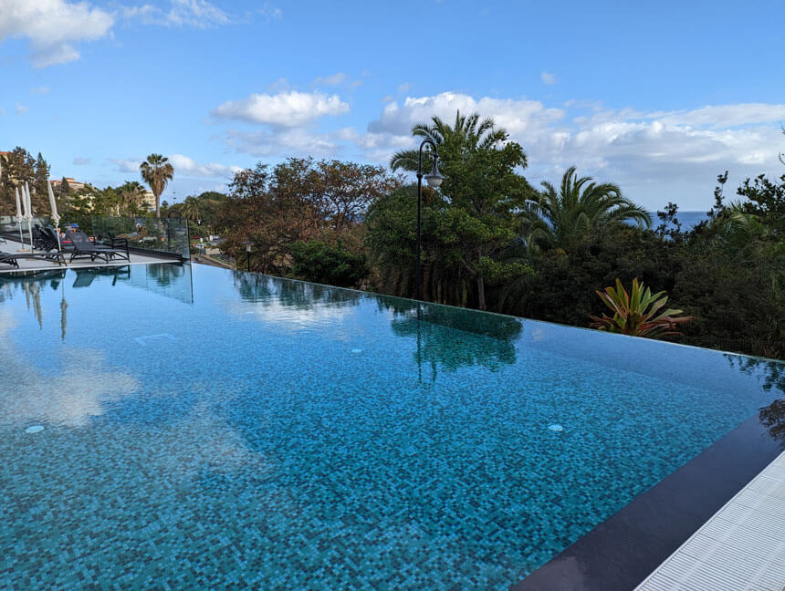 The outdoor pool has an infinity edge