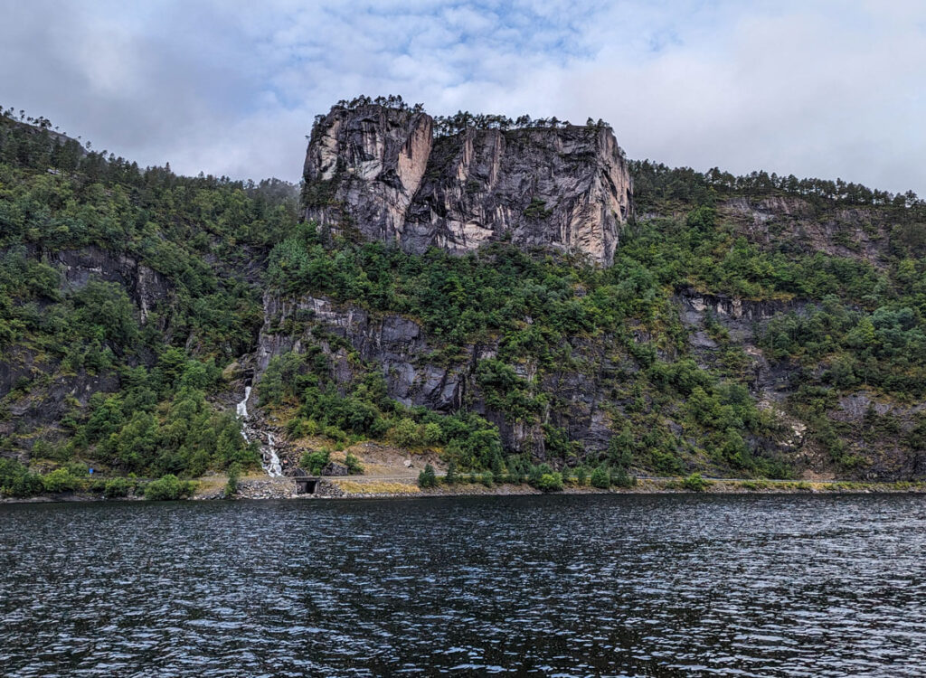 The Slottet rock formation looks like a tree-topped version of the famous Pulpit rock near Stavanger