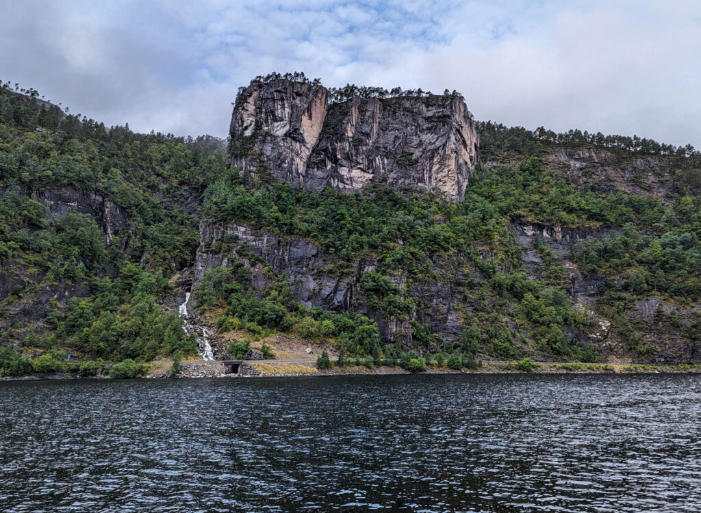 The Slottet rock formation looks like a tree-topped version of the famous Pulpit rock near Stavanger
