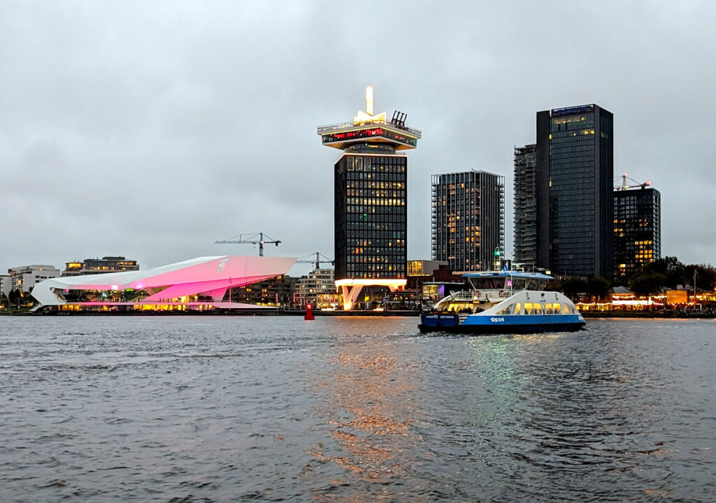 The Eye Filmmuseum is a sculptural white building on the edge of the IJ river