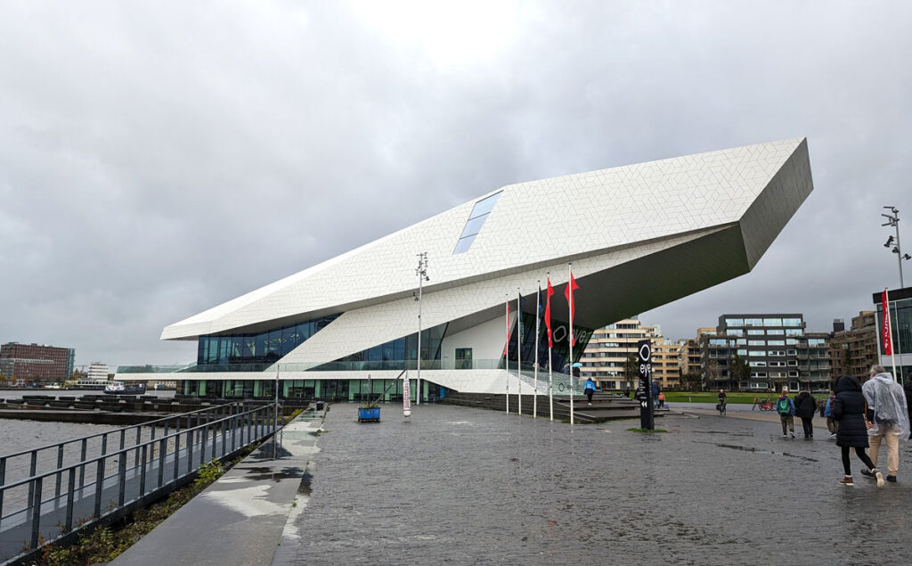 The stunning Eye Filmmuseum building looks like a spaceship has landed on the banks of the river IJ in Amsterdam