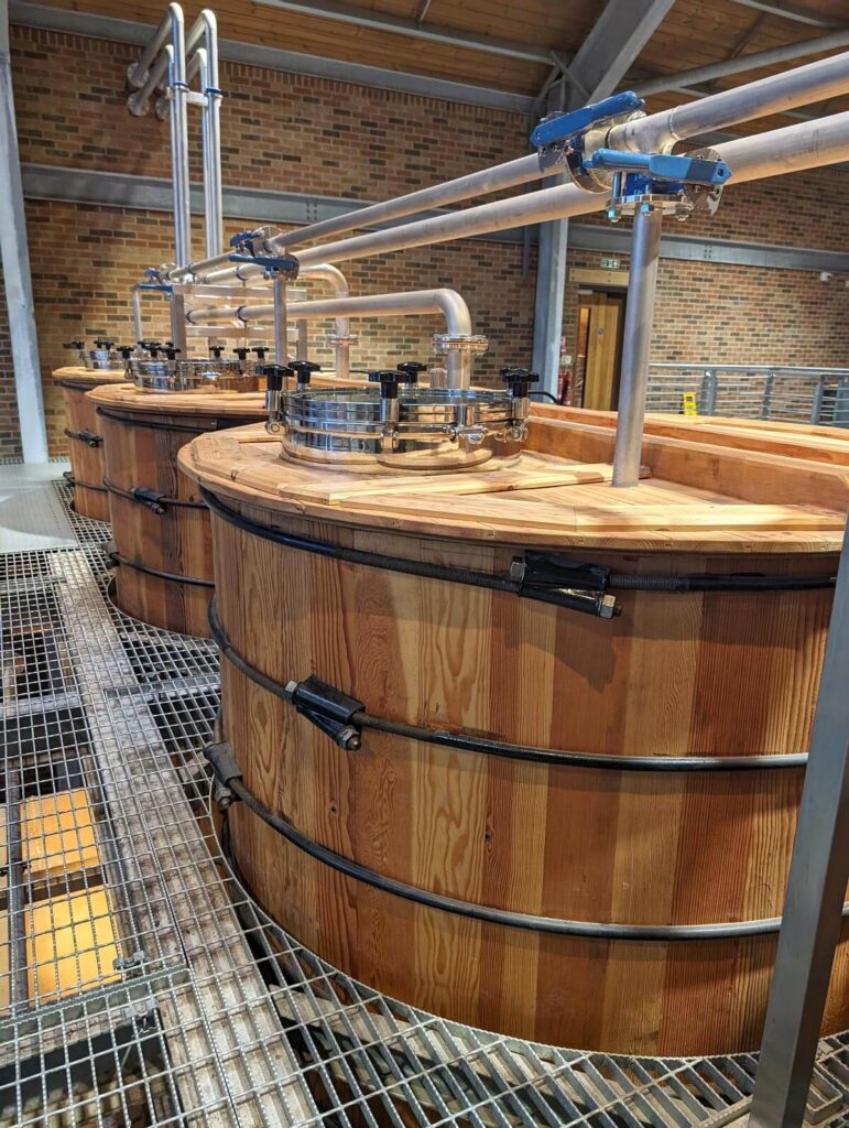 Three of Ad Gefrin's four washbacks. The washbacks are large wooden vats made of Douglas Fir.
