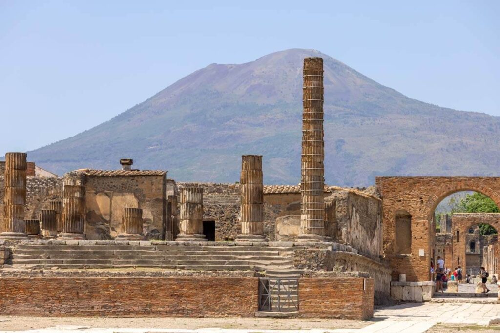 A view of the ancient city of Pompeii, with Mount Vesuvius behind. Entry to Pompeii is free with the Campania Artecard