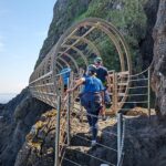 Crossing the Tubular Bridge on the Gobbins Cliff Walk