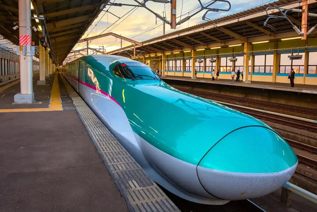 A futuristic high speed train with a long nose