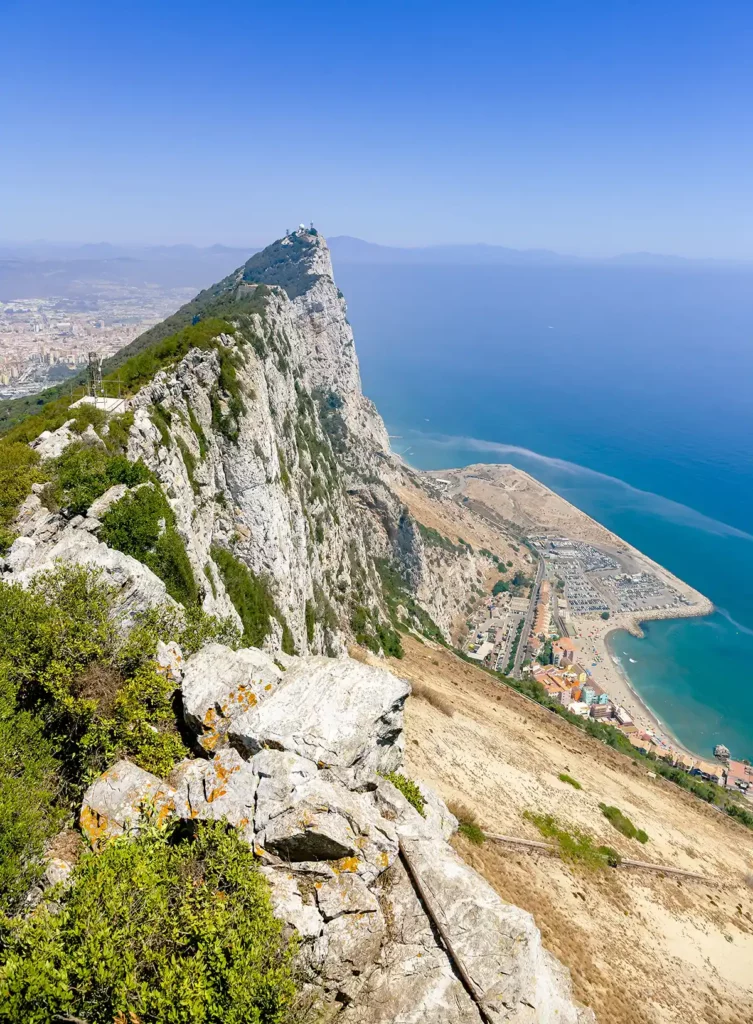 A sharp, jagged cliff above the coast