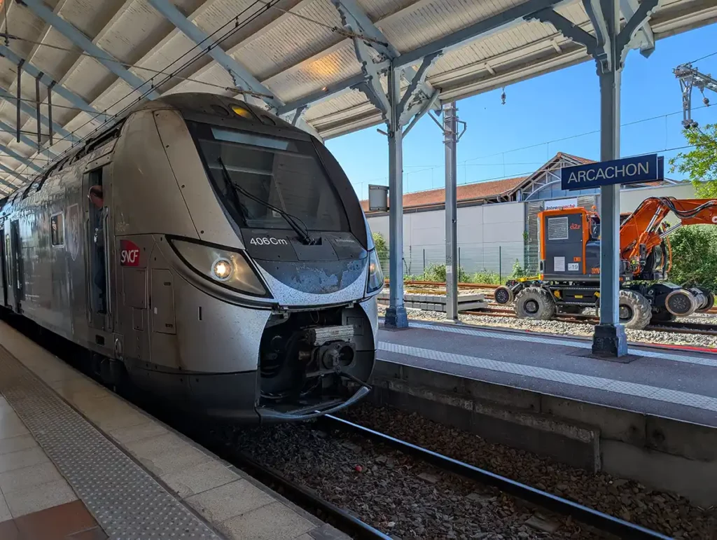 A train from Bordeaux standing at the platform at Arcachon station