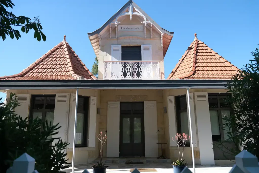 A beautiful, very symmetrical villa with ornate details