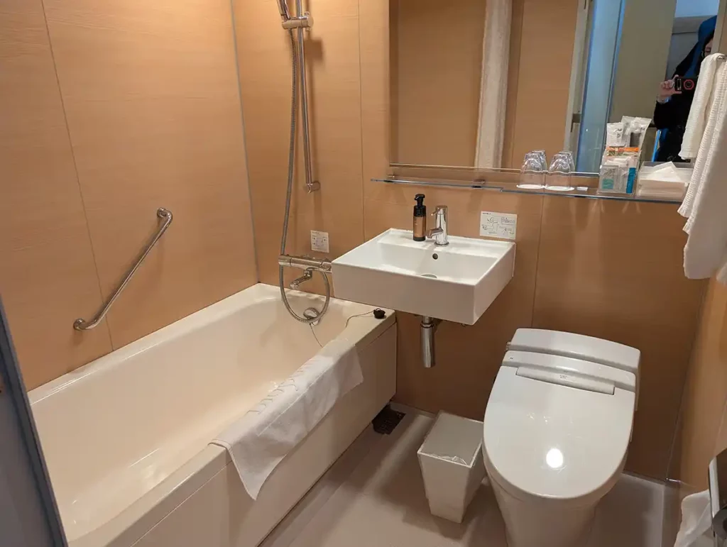 A bathroom in a Tokyo hotel, with electronic toilet