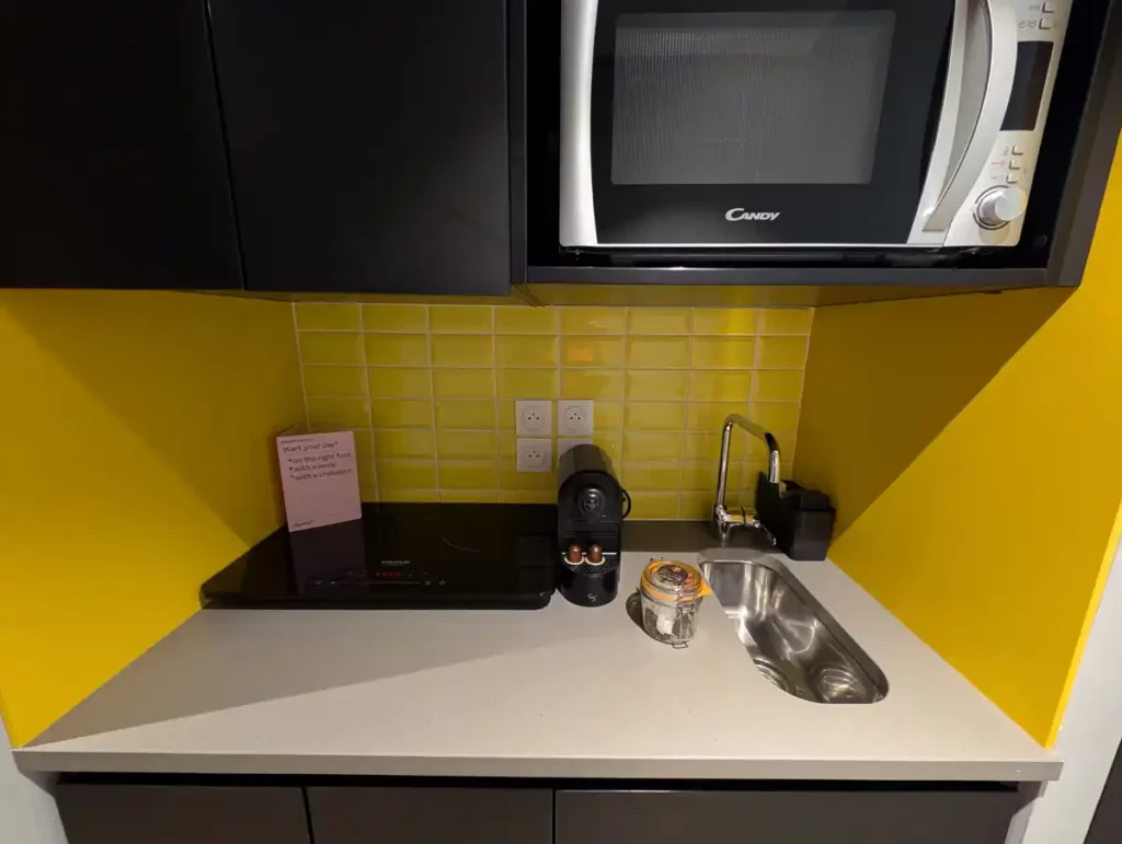 A kitchenette and microwave