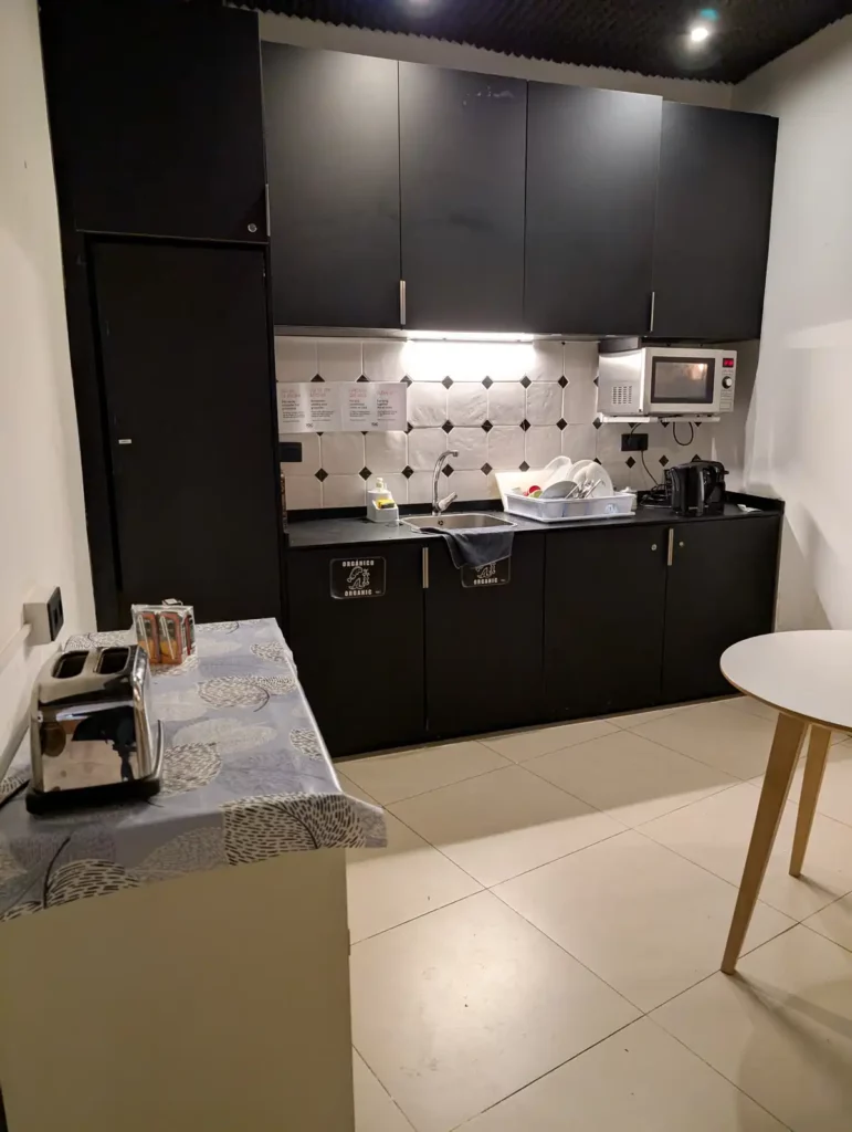 The kitchen at TOC Hostel Malaga