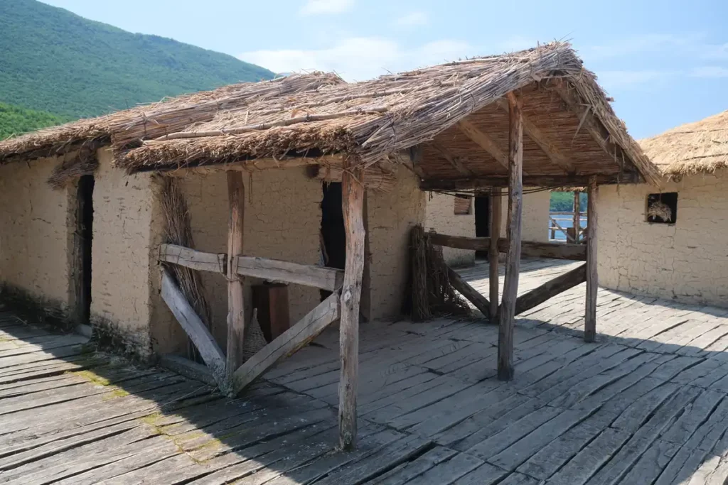 A wooden and straw house