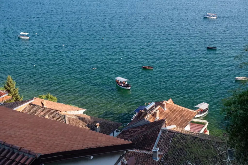 Little boats on a bright blue lake