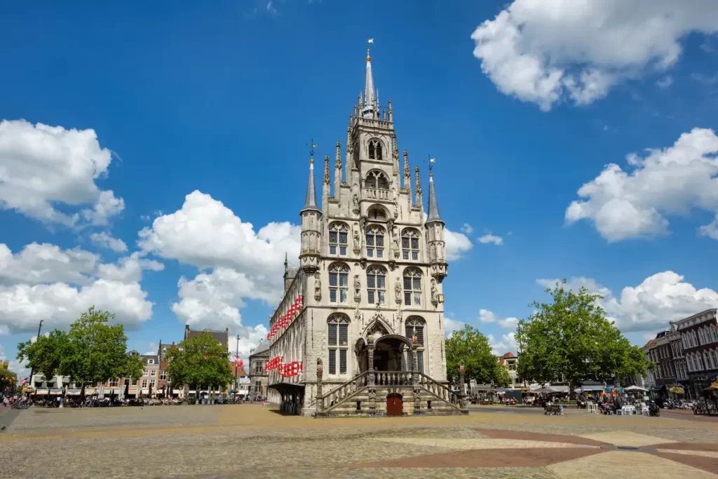 A magnificent ornate town hall, set on its own in a large square