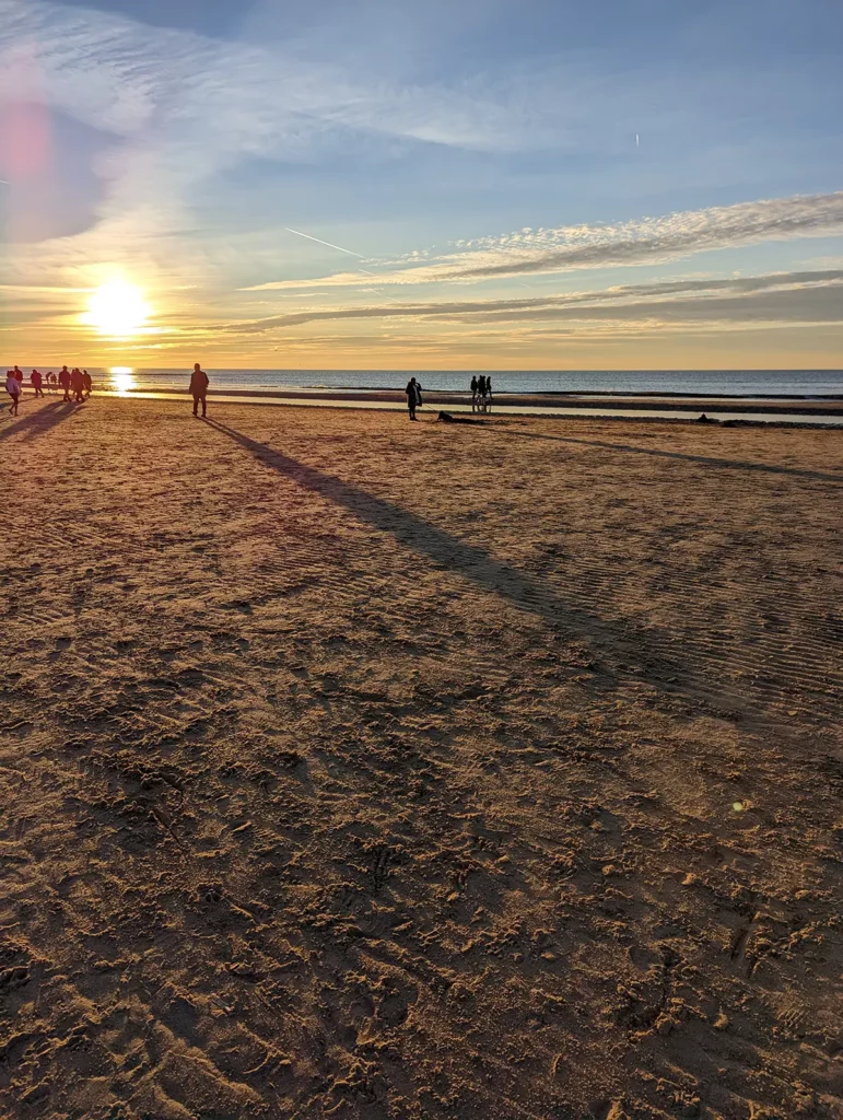 A beautiful wide sandy beach at sunset