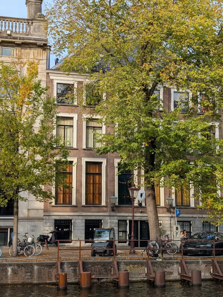 The KattenKabinet cat museum is in a beautiful canal house on a tree-lined canal