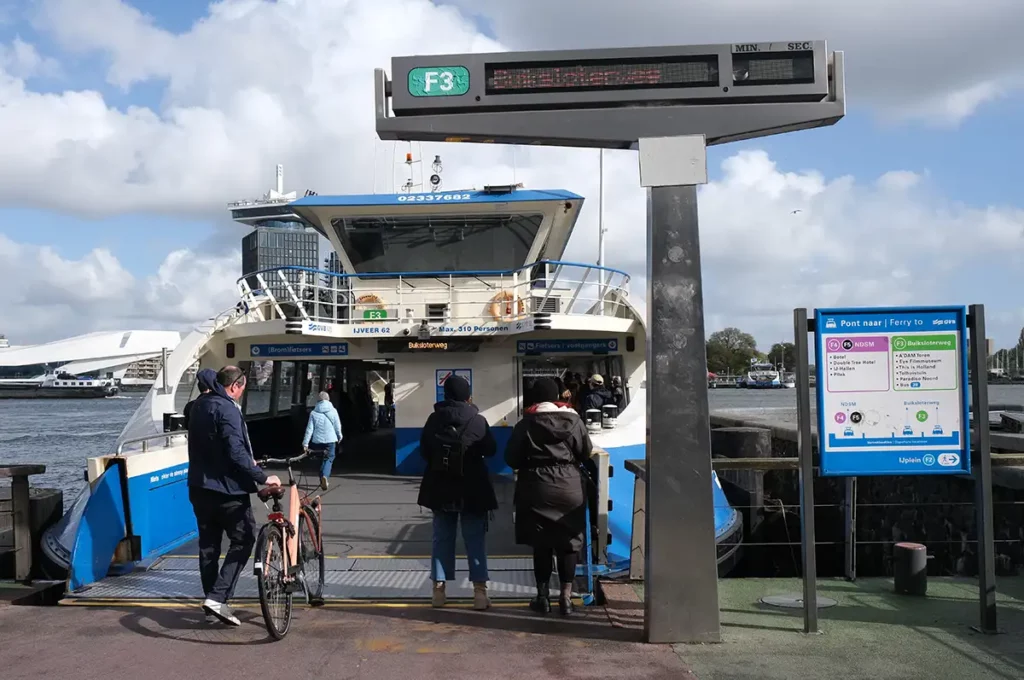 A ferry taking bikes and foot passengers across the river IJ in Amsterdam