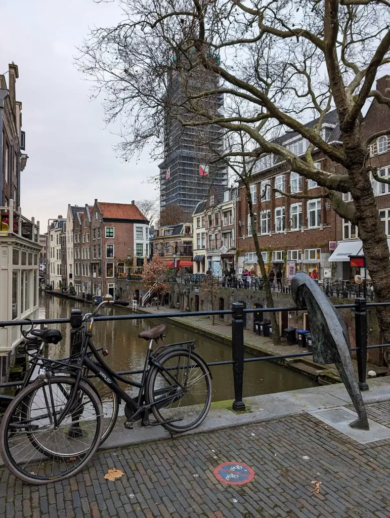 A canal bridge in Utrecht, with the Dom Tower (covered in scaffolding) in the background